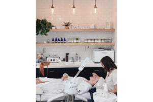 A woman receives a facial with Buy-Rite Beauty's Marie Ozone Facial Steamer
