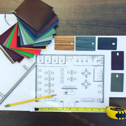 Overhead view of a salon floor plan and wall and flooring color samples.