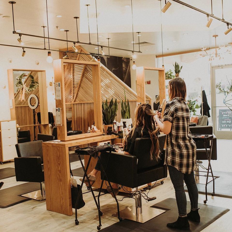 Stylist with a client at Wildflower salon